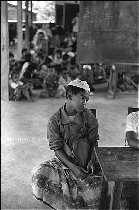 Thailandia, villaggio di Manok. Studente in una scuola coranica.jpg