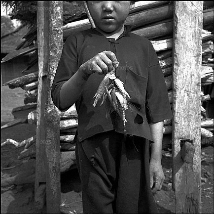 Laos, Kassia. Bambino di etnia Hmong -1.jpg